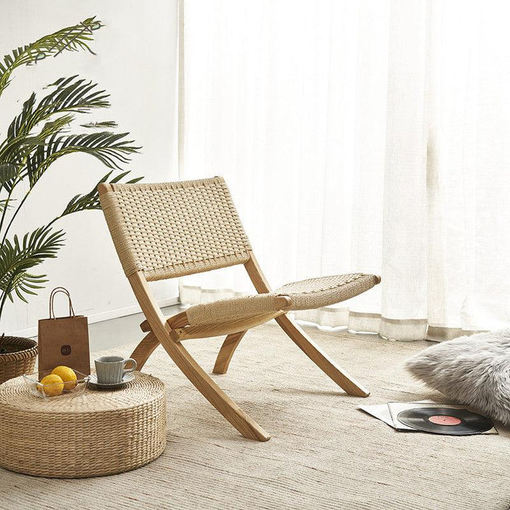 Achmad Rattan Folding Chair - HomeCozify