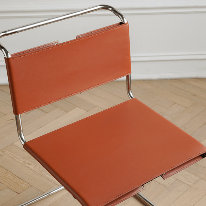Andrej Faux Leather Dining Chair - HomeCozify