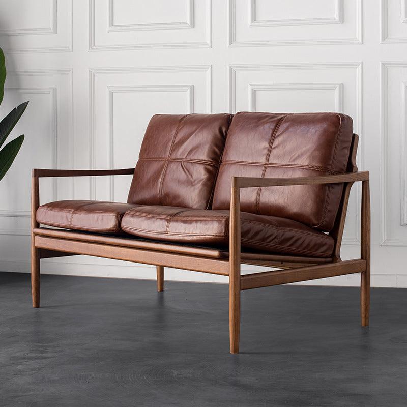 Karola Leather Sofa - HomeCozify