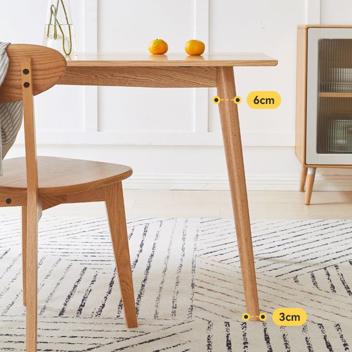 Siri Dining Table - HomeCozify