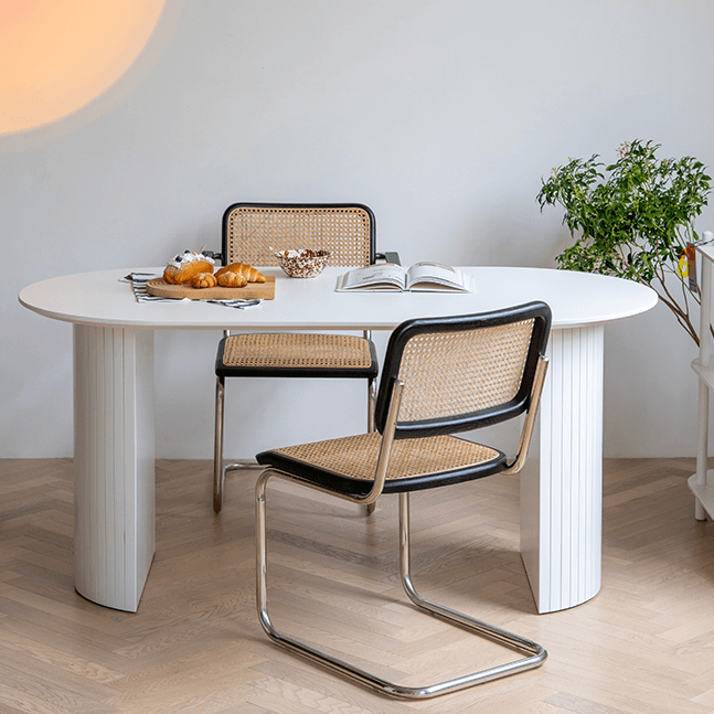 Ismael Oval Dining Table - HomeCozify