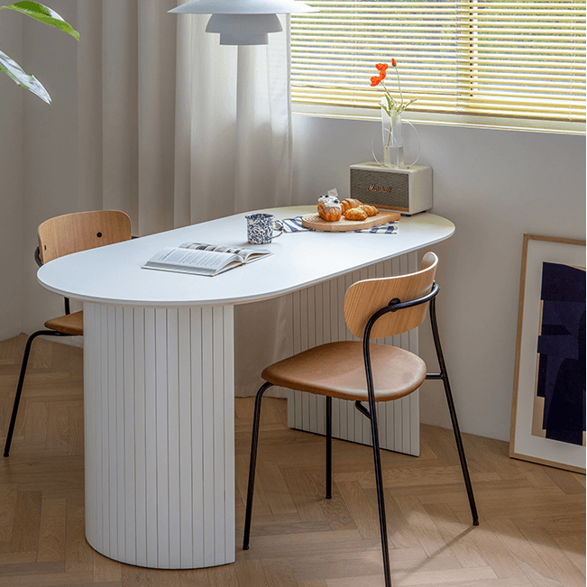 Ismael Oval Dining Table - HomeCozify