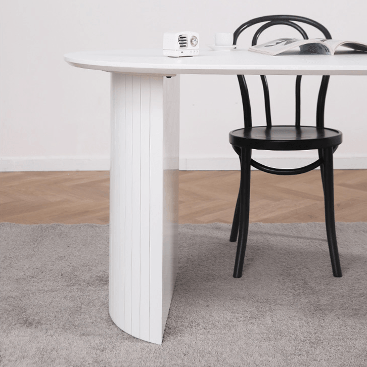 Ismael Oval Dining Table - HomeCozify