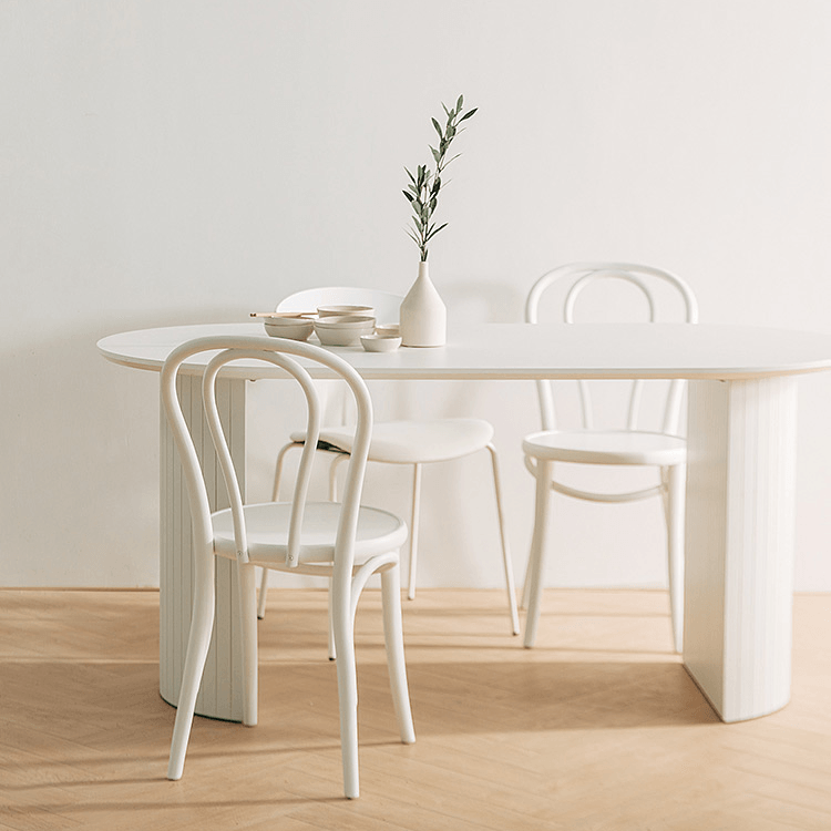 Ismael Oval Dining Table - HomeCozify